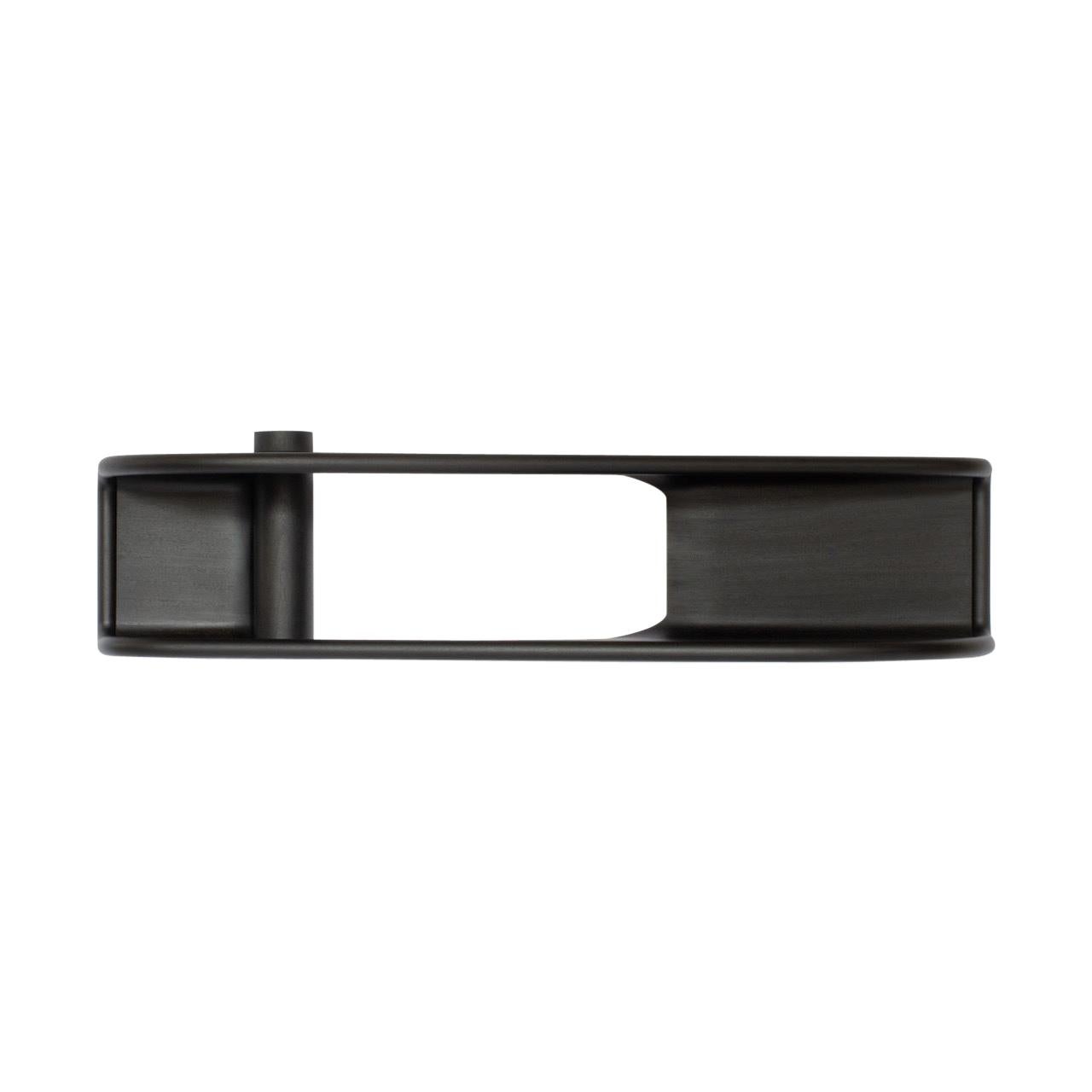 This sculptural wall-mounted console is part of a new line of contemporary furniture designed by blending digital technology with fine traditional craftsmanship. Carved from several pieces of ebonized wood, this large-scale piece features two