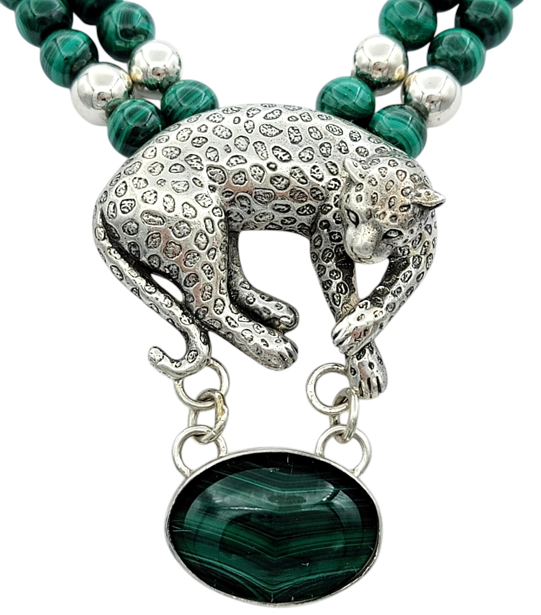 Unleash your wild side with this striking Carol Felley statement necklace, featuring a bold cheetah pendant poised for elegance and adventure. The regal cheetah, crafted in sterling silver, exudes power and grace with intricate detailing that