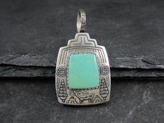 Carol Felley Pendentif Kachina réversible en argent sterling et turquoise
