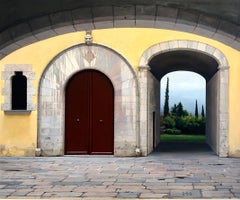 Altered - Medieval Architecture and Arched Doorways Leading to Lush Landscape