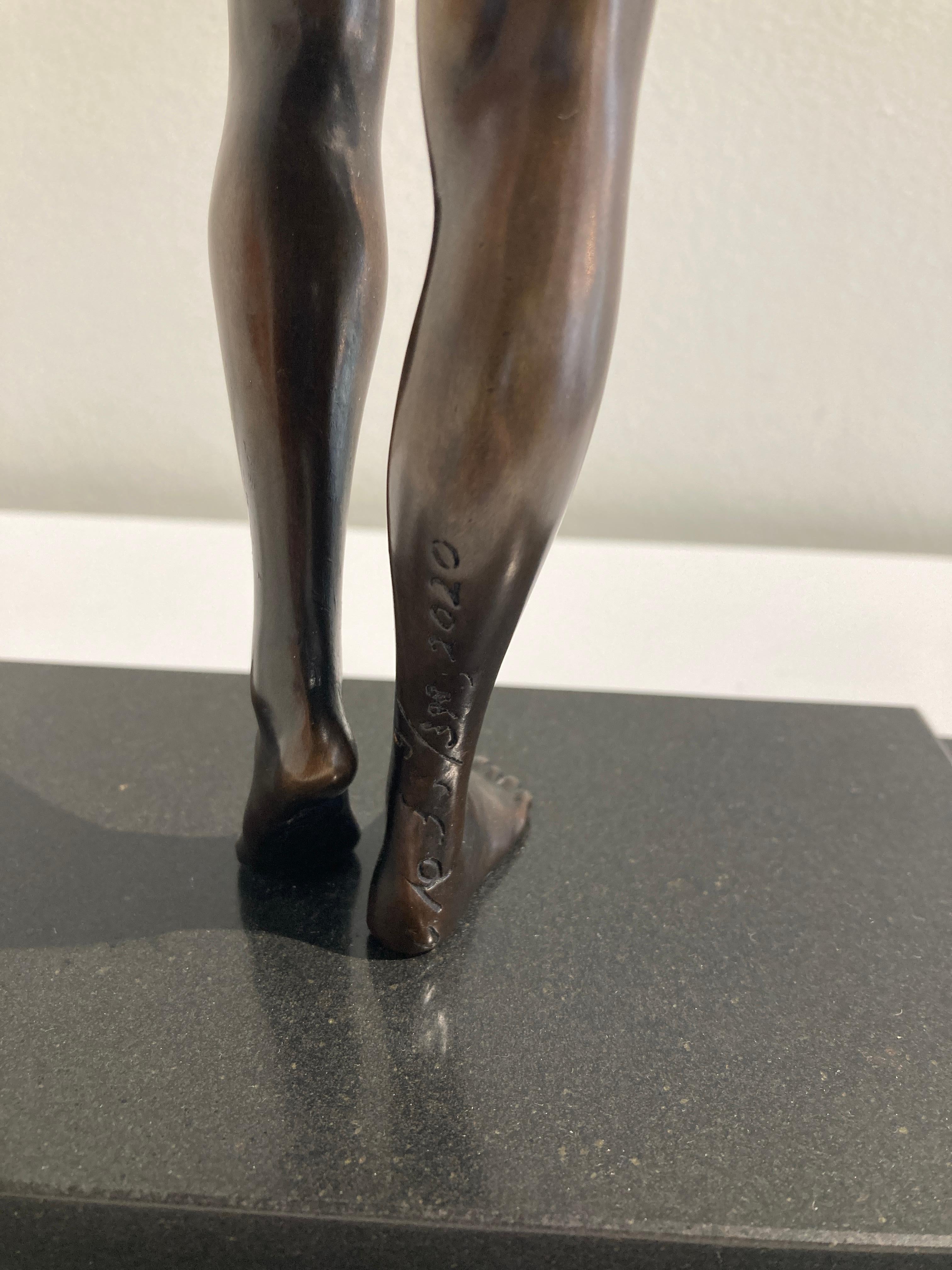 Painted bronze with stone base. 
Limited and signed edition number 9 of 398. 

Carole A. Feuerman (born 1945) is an American sculptor and author working in Hyperrealism. She is one of the three major artists credited with starting the movement in