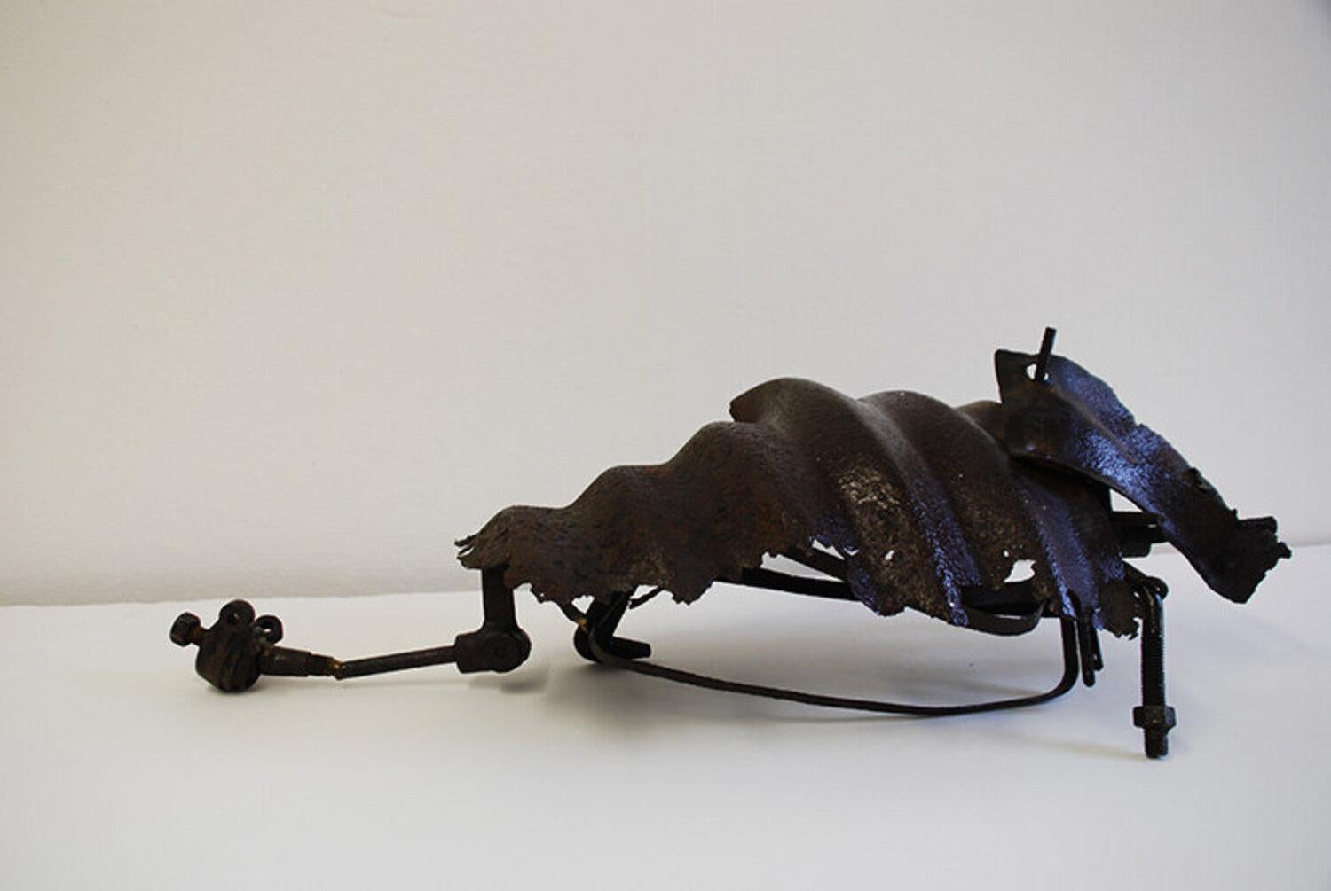 Carole Eisner Abstract Sculpture - Armadillo, scrap metal abstract sculpture