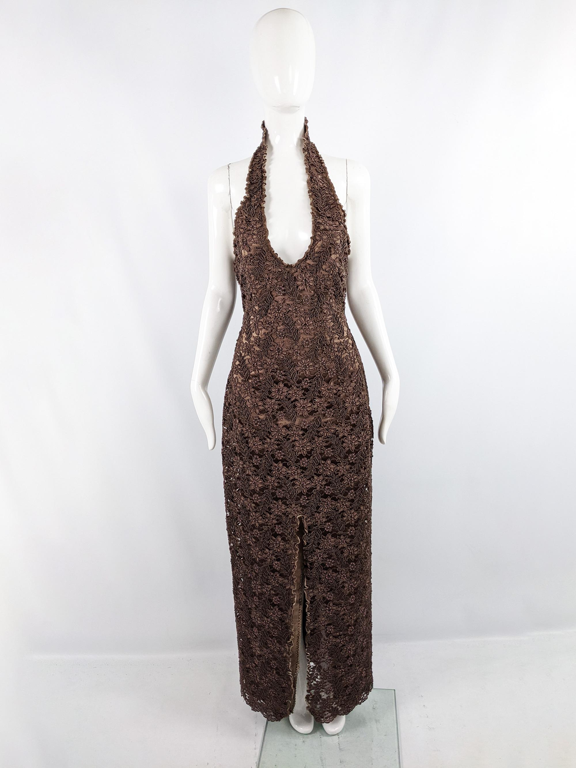 An incredible vintage womens halterneck maxi evening gown from the 80s by luxury British fashion designer, Carole Lee - known for her unique and luxurious fantasy inspired eveningwear in the 1980s. This dress is a perfect example, in a weighty brown