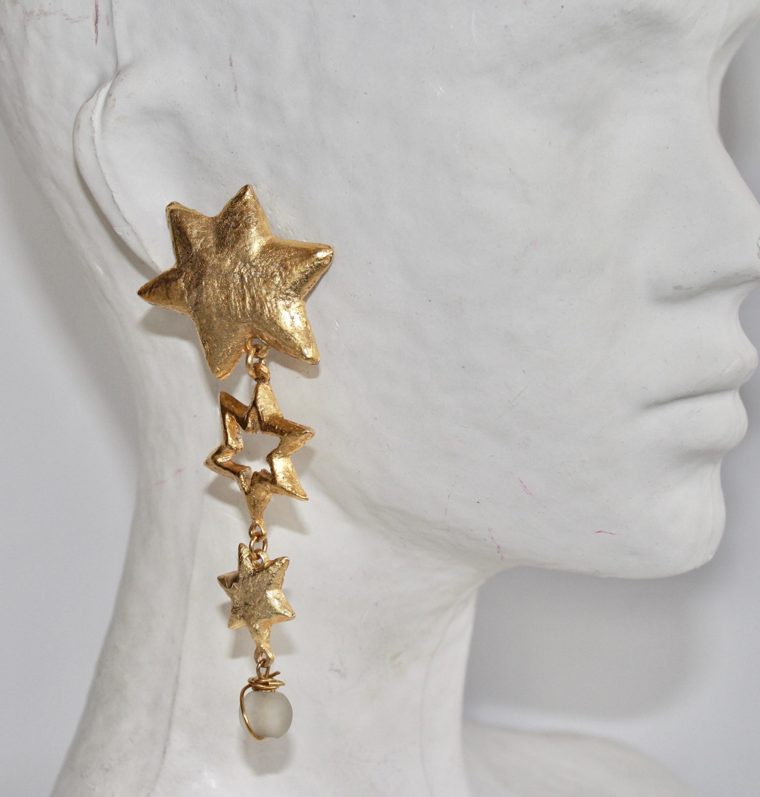 Fabulous and chic gold star clip earrings with polished crystal beads handmade in Paris by Carole Saint Germes. 