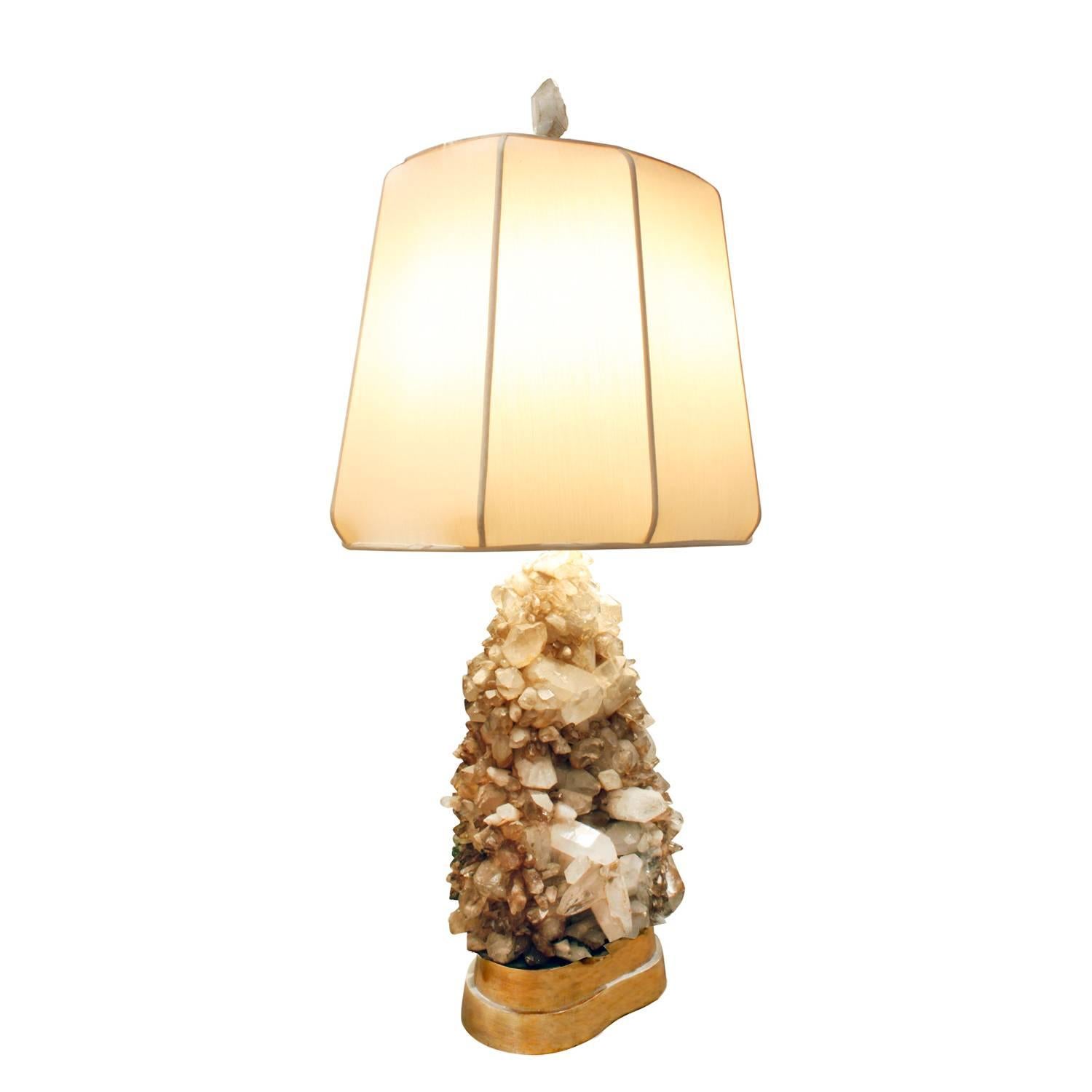 Large studio made table lamp clad in quartz crystals with gilded base and original crystal finial by Carole Stupell, American, 1950s.