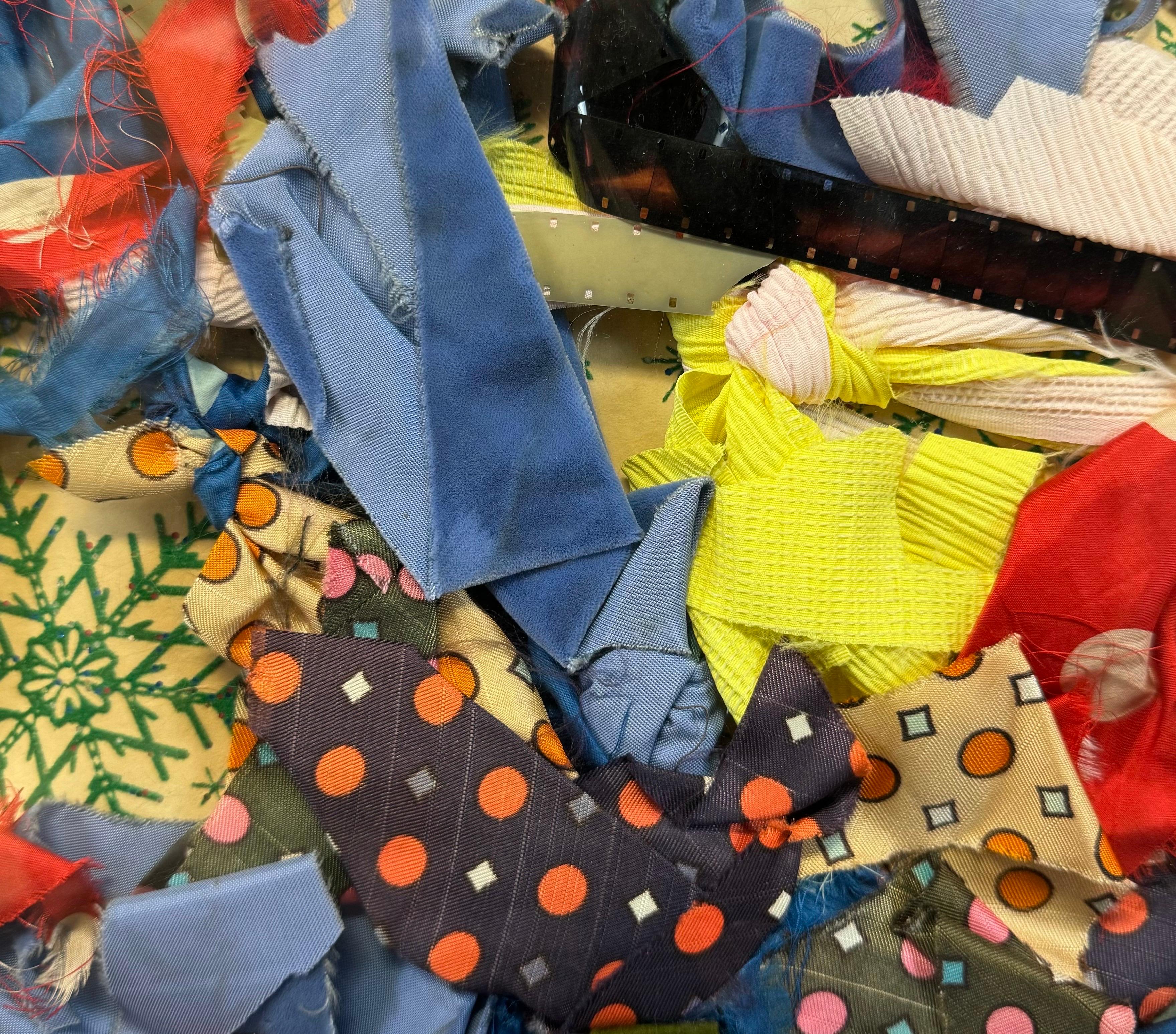 “Untitled, 1966” by Carolee Schneemann (American, 1939-2019)

A rare, early collage by Carolee Schneemann composed of ribbons, film, and gift-wrapping paper. The piece is an explosion of color and texture, with layers of fabric scraps, ribbons, and