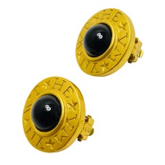 CAROLEE signed matte gold black cabochon designer clip on earrings