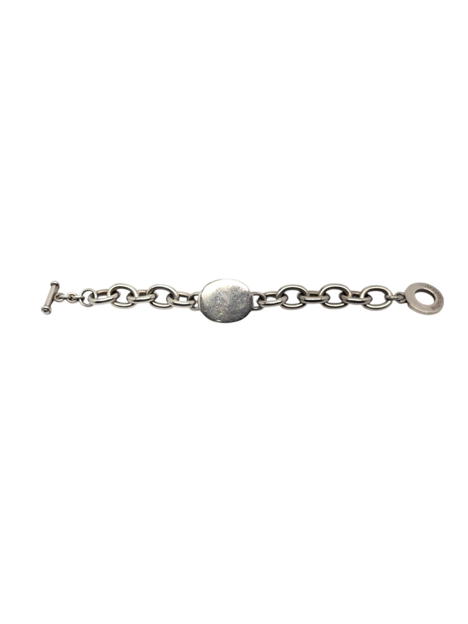 Bracciale A Link in argento sterling di Carolee...

Questo braccialetto vintage con chiusura ad alamaro reca la scritta 