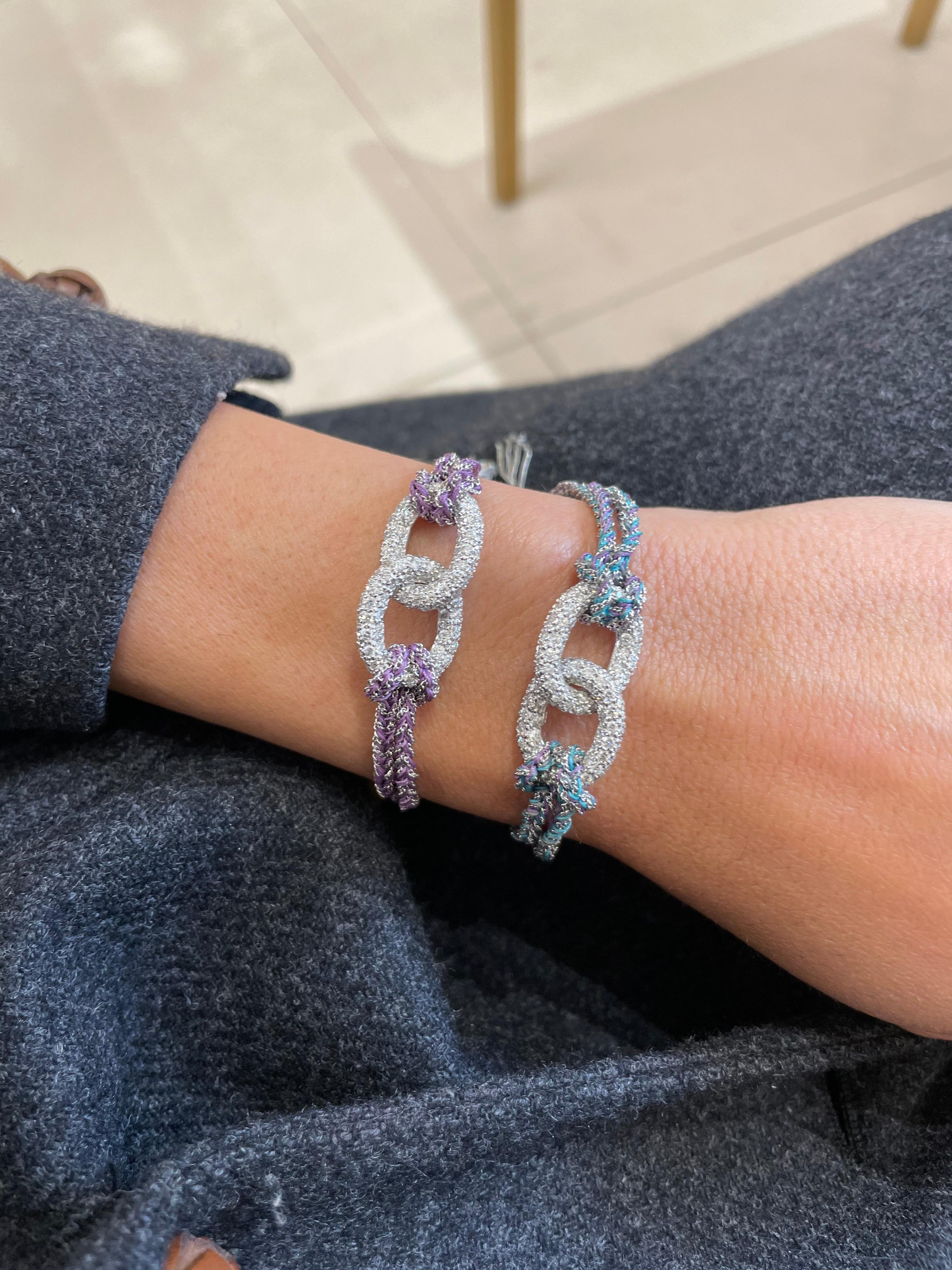 Carolina Bucci makes inspiring, distinctive jewellery designed with a reverence for craftsmanship and executed with elegance.
Two white diamond pavé links are shown here combined with two Intuition Lucky Bracelets. The 18k white gold diamond-cut