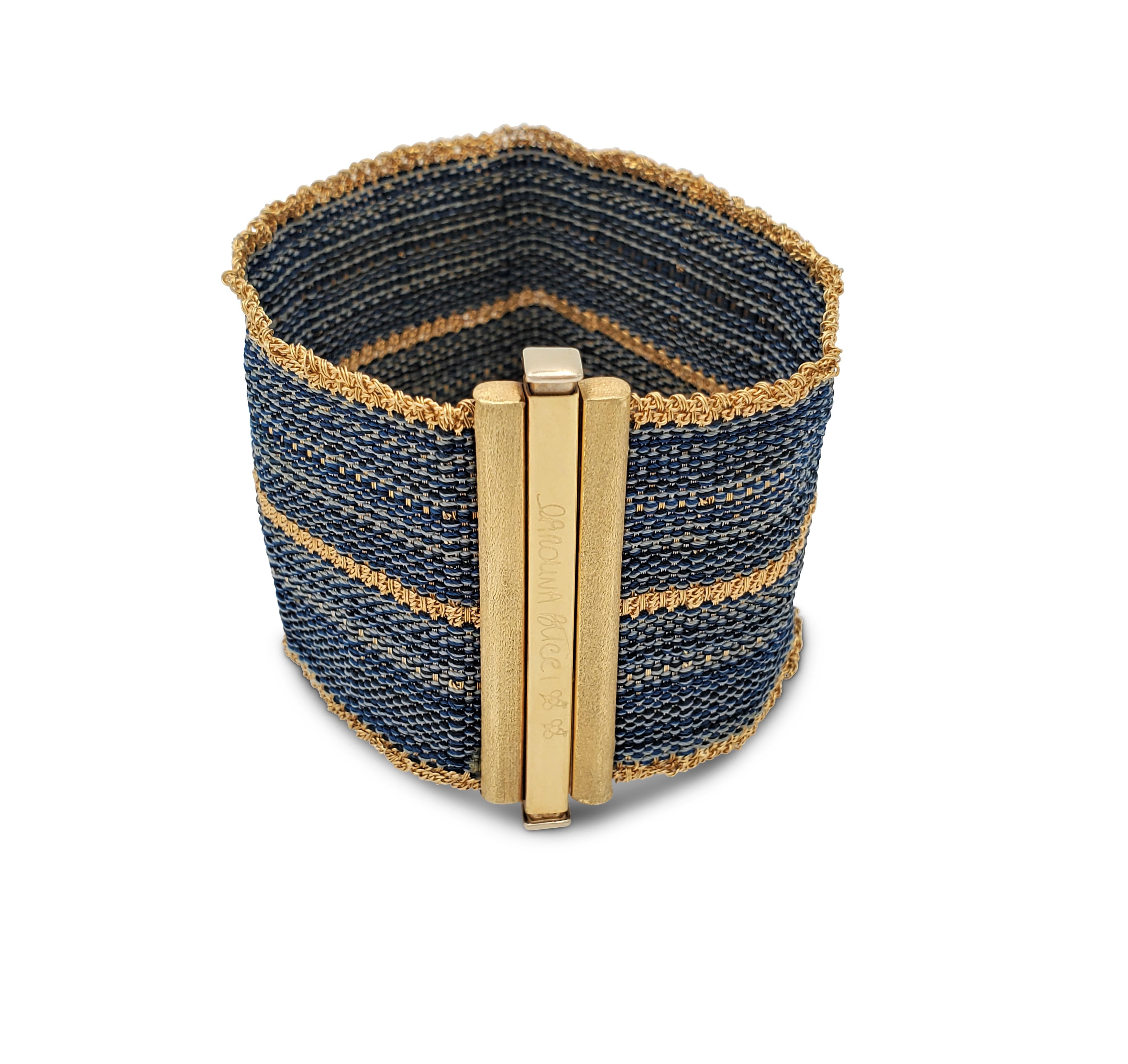 Authentic Carolina Bucci bracelet crafted in 18 karat yellow gold chain and silk thread intertwined with gold push-down bar clasp. Signed Carolina Bucci, 750. The bracelet measures 39mm in width and 6 1/4 inches in length. Not presented with