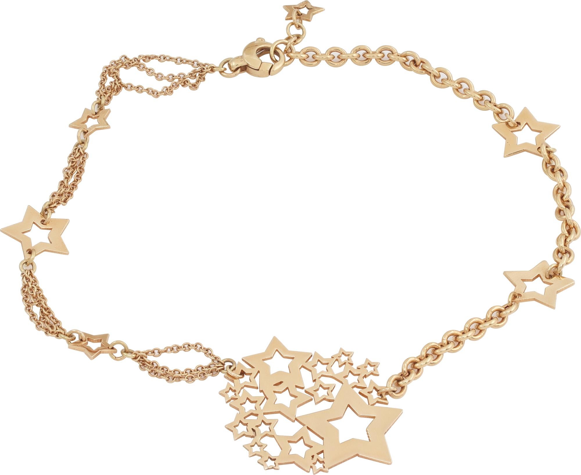 Collana girocollo con stelle e ancora stelle in oro giallo 18 carati. Firmato Carolina Bucci, realizzato in Italia. Lunghezza 15 pollici