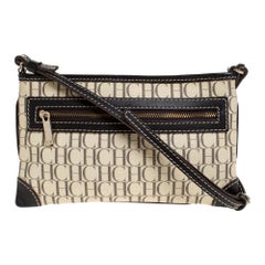 Carolina Herrera Umhängetasche aus beschichtetem Segeltuch und Leder mit schwarzem/ elfenbeinfarbenem Monogramm