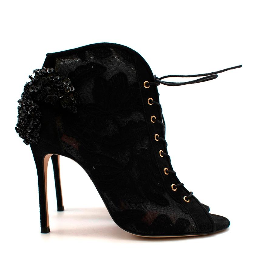 Carolina Herrera Black Lace & Suede Embroidered Open Toe Heeled Ankle Boots 

-Gorgeous sheer lace with a floral motif 
-Luxurious sequin embroidery to the back 
-Lace up fastening to the front 
-Stiletto heels 
-Golden hardware
-Soft leather lining