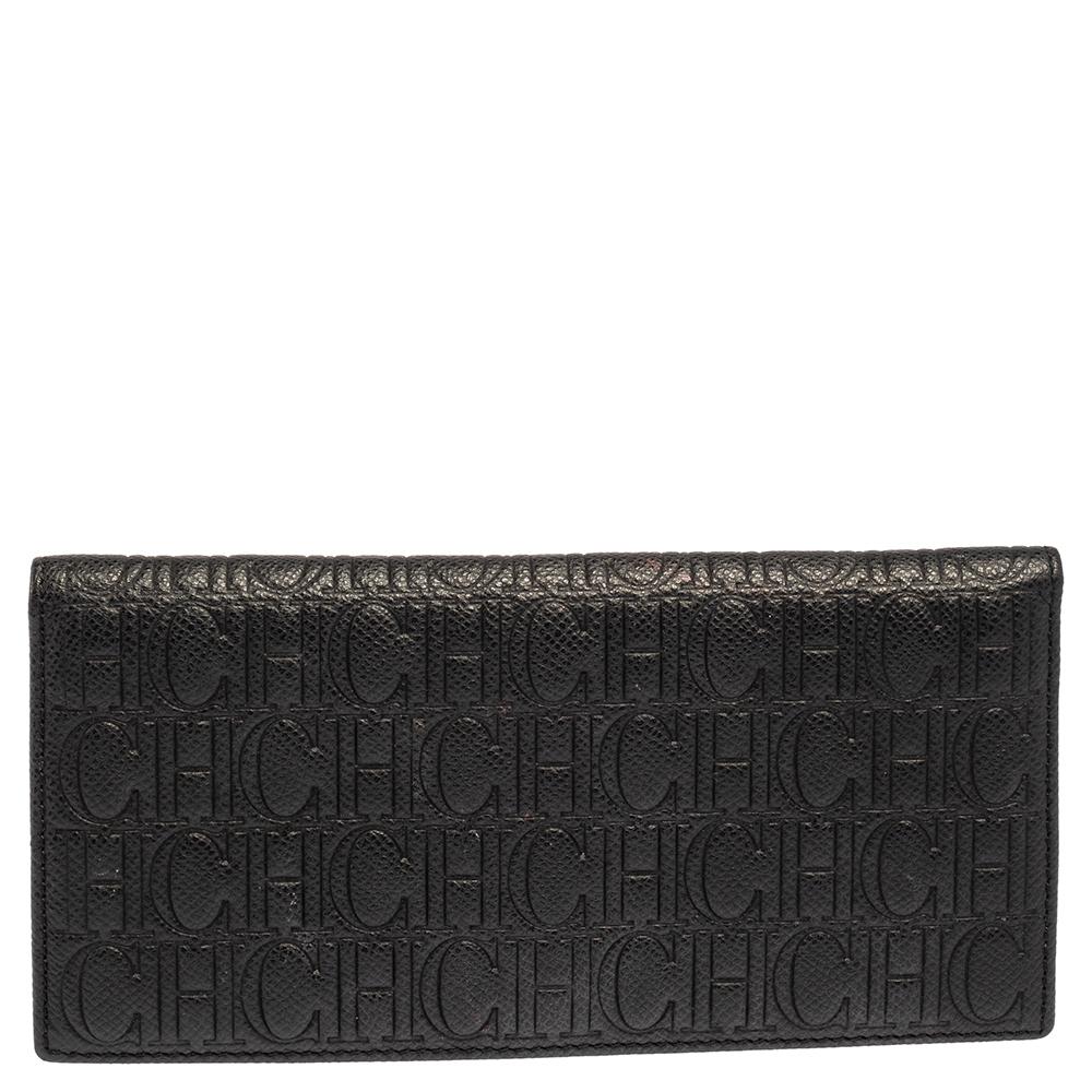 Ensure your essentials are in place with this long wallet from Carolina Herrera. Crafted using monogram-embossed leather, the black-hued wallet for women has a well-designed interior. It is finished with gold-tone hardware.

