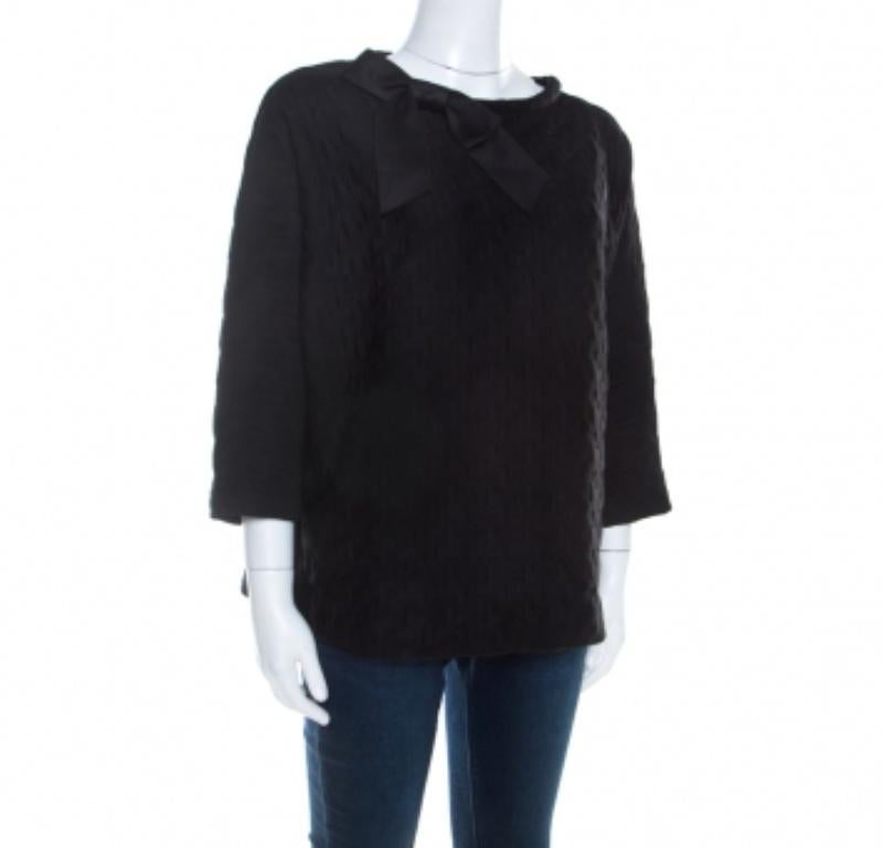 Carolina Herrera ti propone questo top unico e non convenzionale, bello e intelligente. Aggiungi un tocco unico al tuo guardaroba con questo elegante capo nero. Realizzato in tessuto misto, questo top a maniche lunghe è proprio quello che ti serve