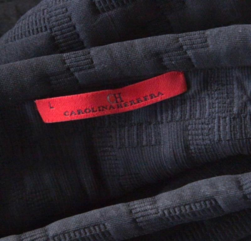 Donna Carolina Herrera Top nero in neoprene elasticizzato con dettaglio fiocco al collo L.L. in vendita