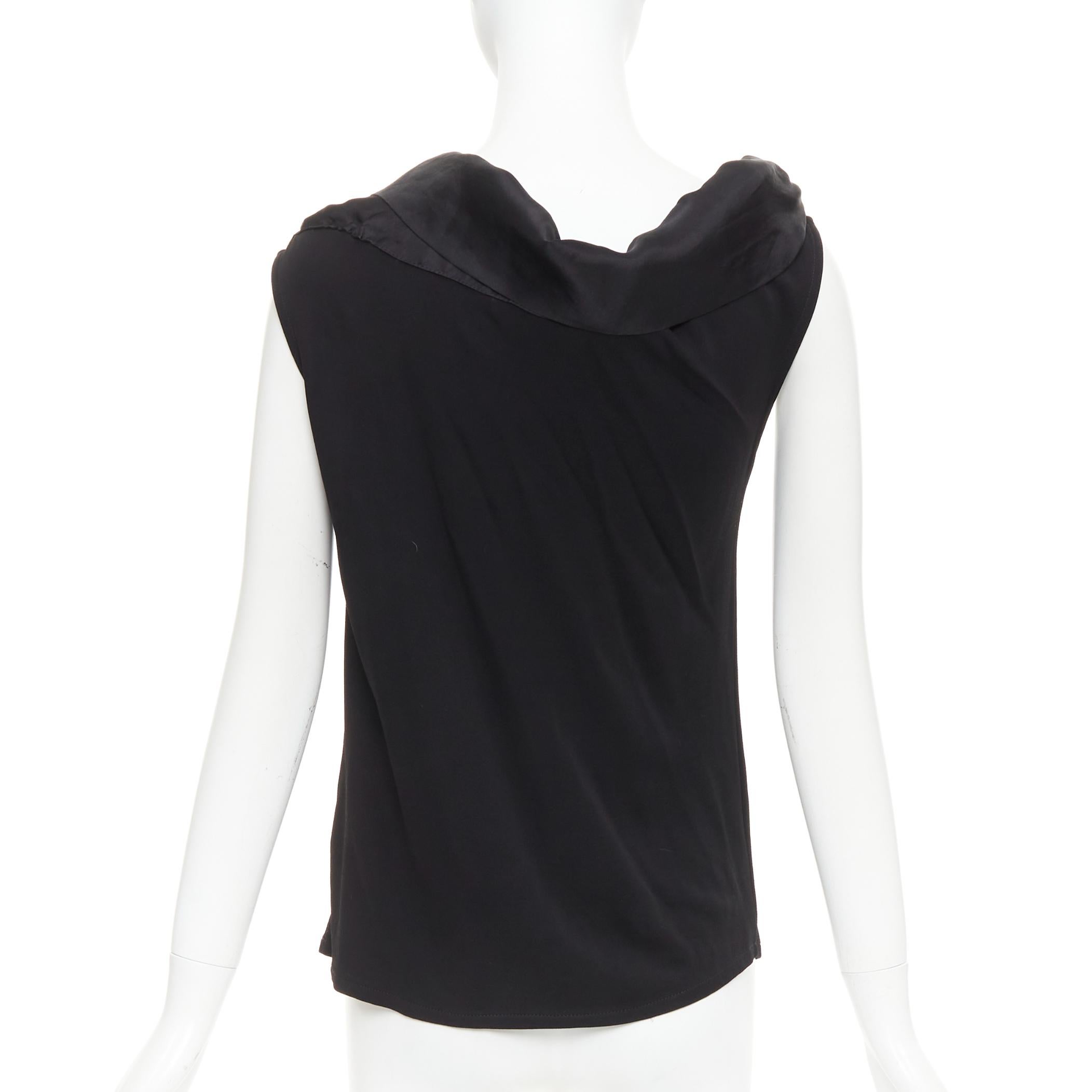 Carolina Herrera canotta asimmetrica con fiocco in seta di viscosa nera S
Riferimento: CAKK/A00030
Marchio: Carolina Herrera
Materiale: Viscosa, seta
Colore: nero
Modello: Tinta unita
Chiusura: Slip On
Dettagli extra: Design con fiocco da