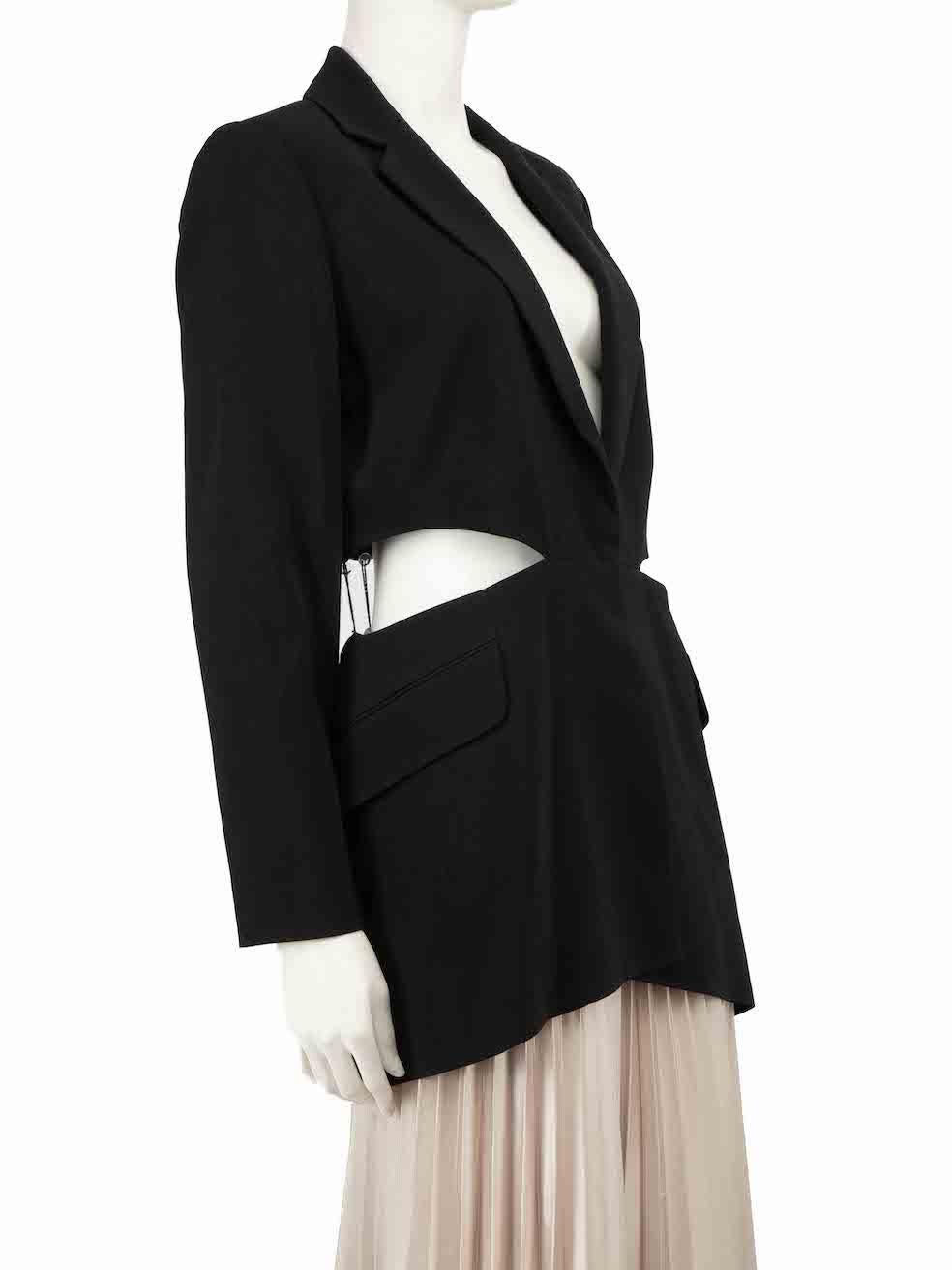 CONDITION is Very good. Minimal wear to blazer is evident. Minimal wear to external and internal waist with small plucks to the weave on this used Carolina Herrera designer resale item.
 
 
 
 Details
 
 
 Black
 
 Viscose
 
 Mid length blazer
 
