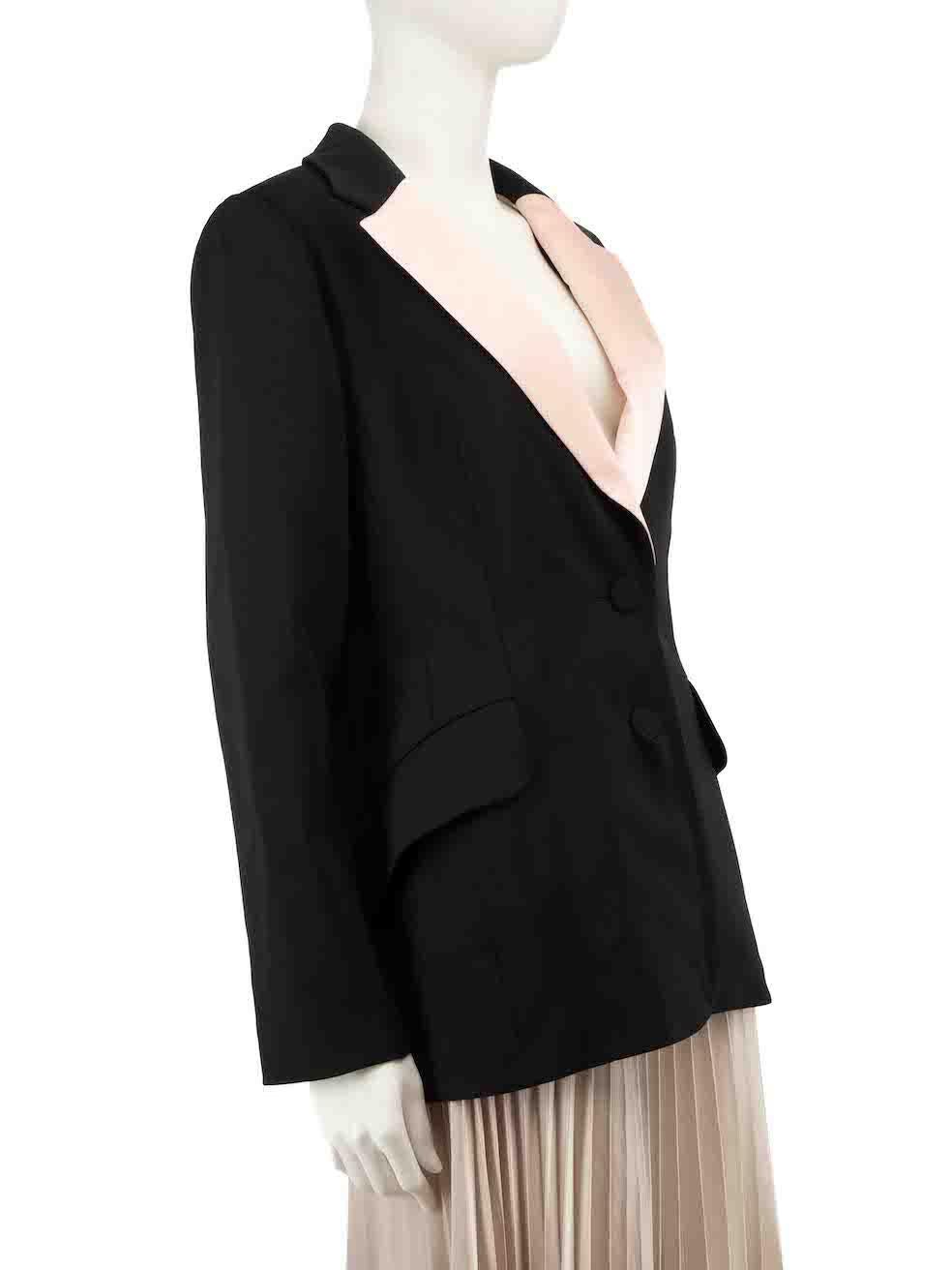 CONDITION is Never worn, with tags. No visible wear to blazer is evident on this new Carolina Herrera designer resale item.
 
 
 
 Details
 
 
 Black
 
 Wool
 
 Blazer jacket
 
 Pink satin lapel
 
 Single breasted
 
 Chest pocket
 
 2x Front side