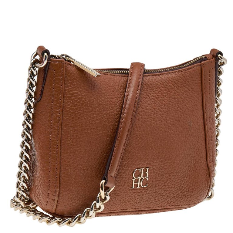 Carolina Herrera wallet chain crossbody bag Price : BD 136 Size : mini ( 15  cm x 8 cm ) With dust bag only