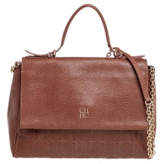 Carolina Herrera - Sac Minuetto en cuir gaufré marron avec monogramme et poignée supérieure