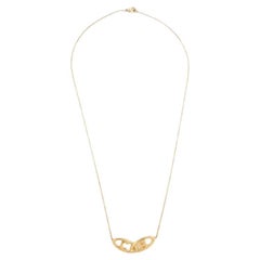 Carolina Herrera CH Gold Tone Logo Pendant Necklace