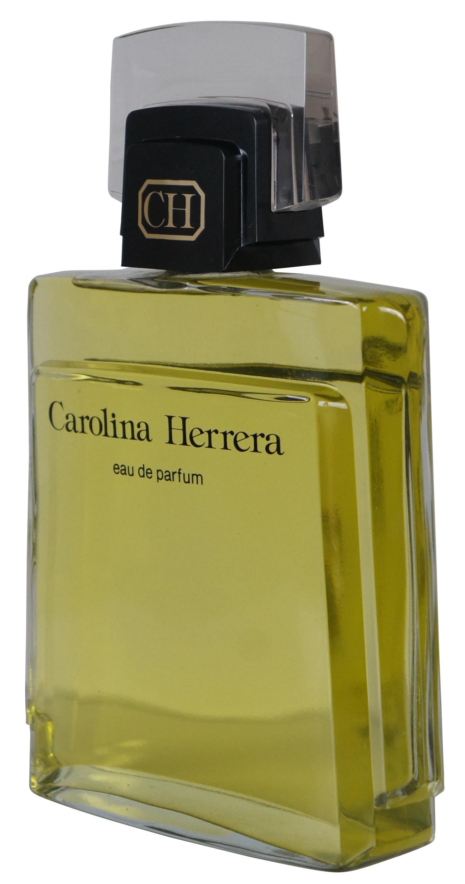 Vintage Carolina Herrera designer fragrance factice or dummy bottle with an elegant modern art deco inspired design, originally part of a department store display. Measure: 12