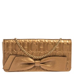 Carolina Herrera Gold Monogram Embossed Leather Bow Chain Clutch