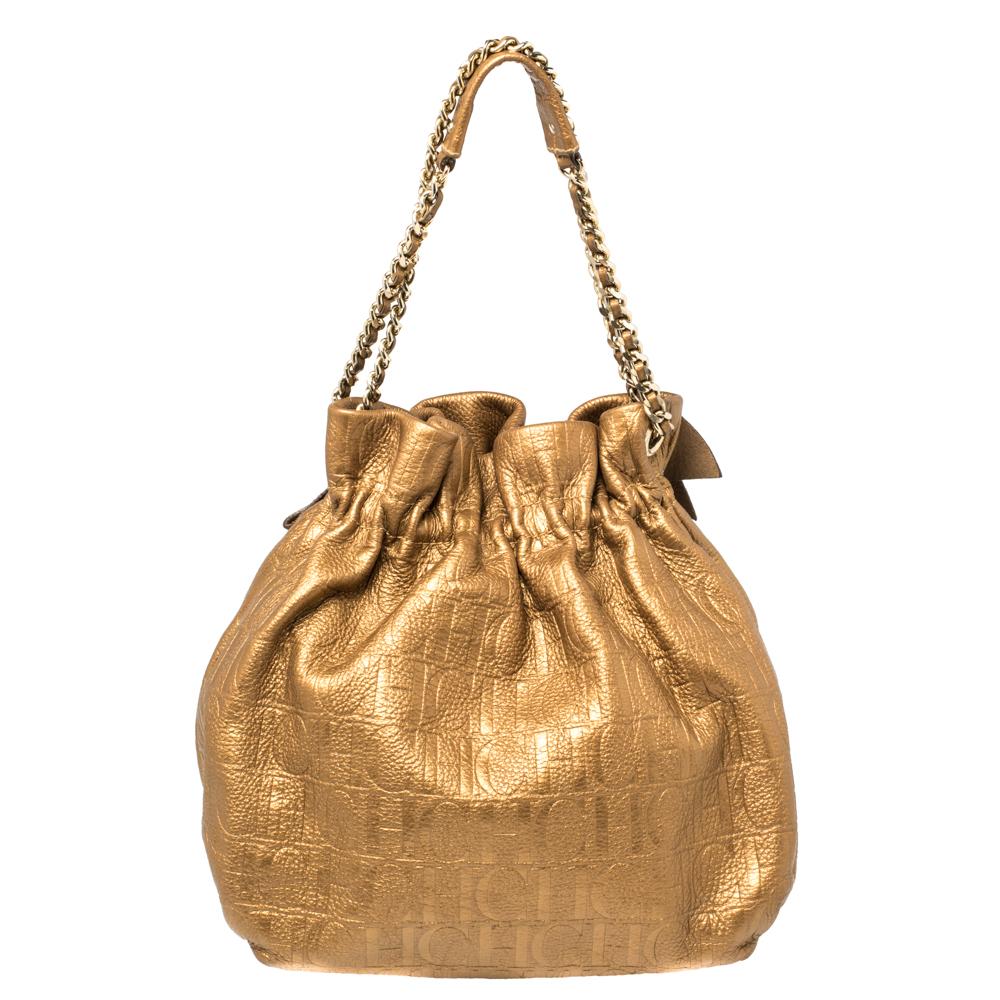 A beautiful bag is stylish and multi-functional with a spacious interior, just like this Carolina Herrera piece which is perfect for the day time. Crafted in the most stunning golden brown leather, this bag is embossed with the signature CH pattern