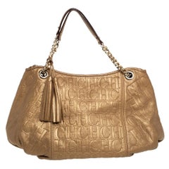 Carolina Herrera Golden Brown Monogram Embossed Leather Tassel Hobo