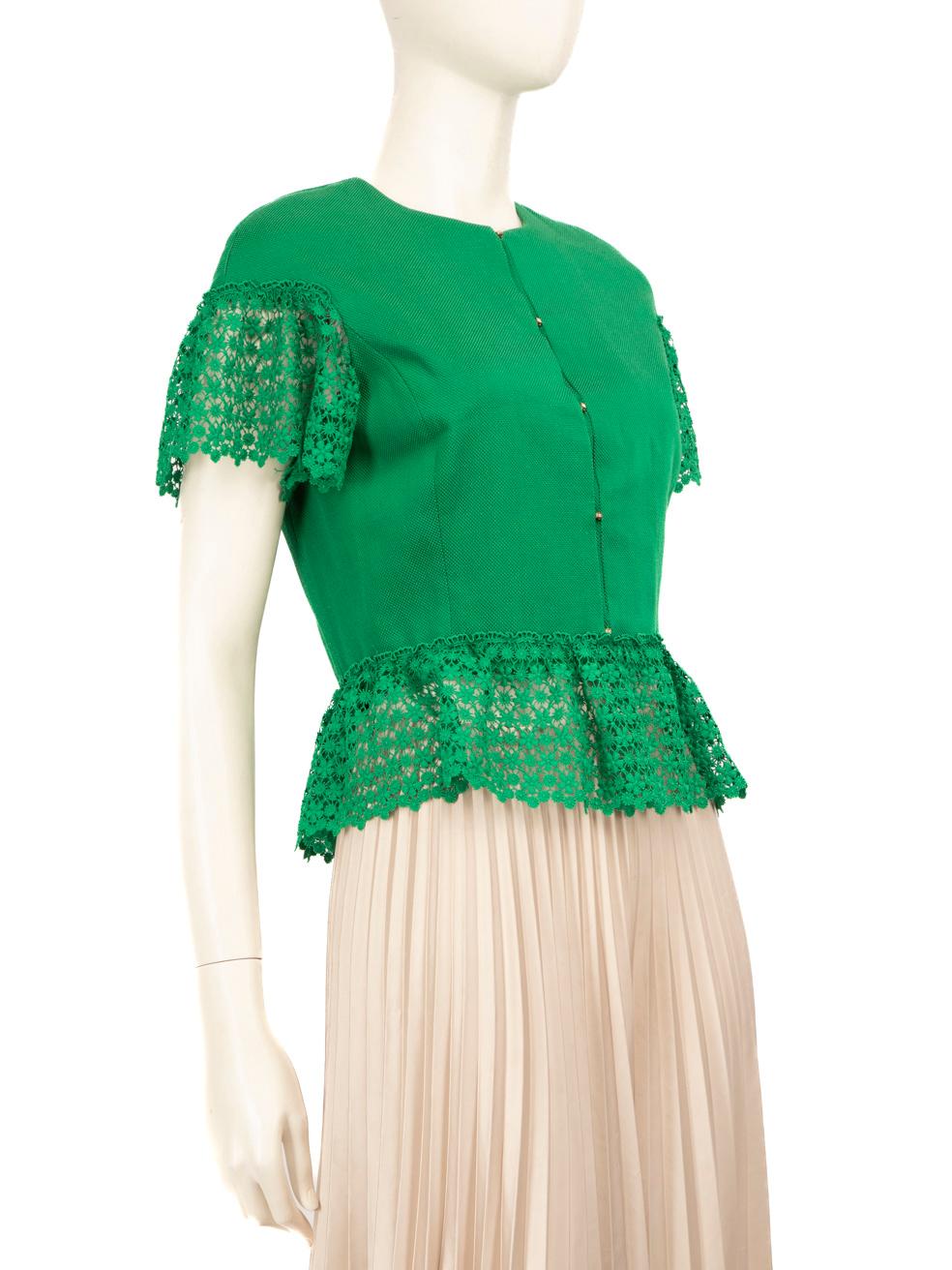 CONDITION is Very good. Minimal wear to the top is evident, there is light discolouration on the lining of the top around the underarm area and some fraying can be seen along the shoulders and on the front on this used Carolina Herrera designer