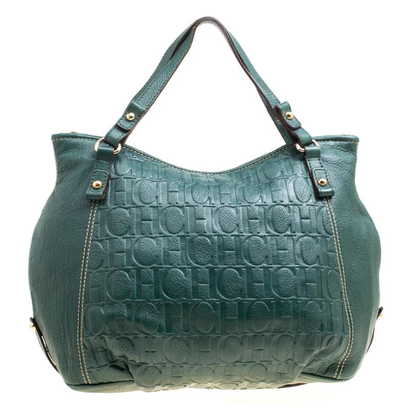 This Carolina Herrera hobo has a lovely shape and it comes in green. The bag is created from monogram leather and detailed with two handles and a spacious fabric interior for your essentials. It is gorgeous and ideal for daily use.

Includes: The
