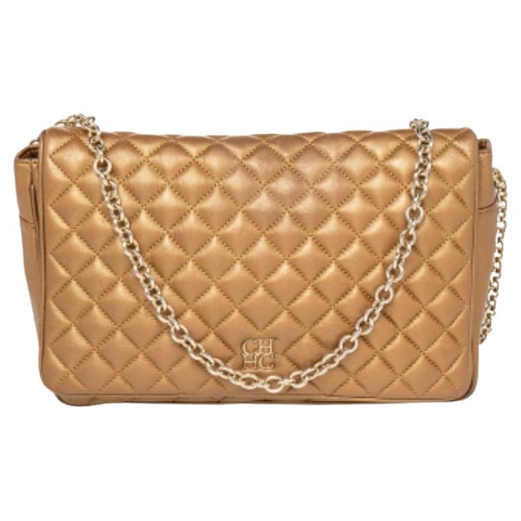Carolina Herrera - Borsa a tracolla con tracolla a catena in pelle trapuntata oro metallizzato