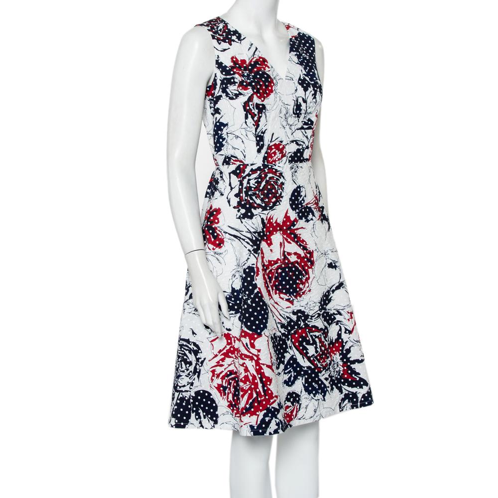 A dress like this one from Carolina Herrera creations will make you stop and stare. Make a worthy addition to your collection with this stylish multicolored dress that is sure to become your favorite. It has a midi length, sleeveless silhouette, and