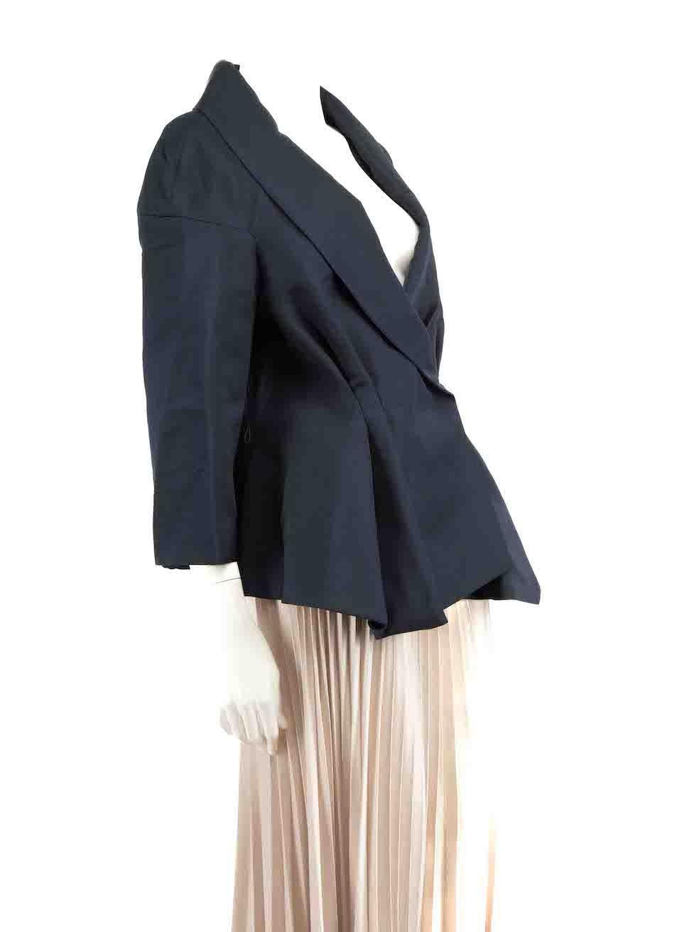 CONDITION is Very good. Minimal wear to jacket is evident. Minimal wear with belt and composition label missing on this used Carolina Herrera designer resale item.
 
 
 
 Details
 
 
 Navy
 
 Synthetic
 
 Fitted jacket
 
 Double breasted with snap