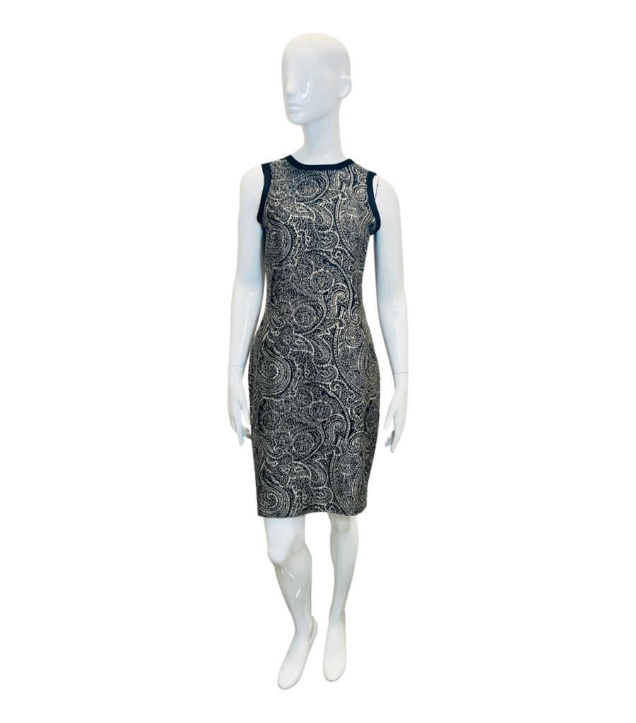 Carolina Herrera Paisley Jacquard Silk & Cotton Dress
Black and white dress designed crafted in Jacquard and designed with Paisley print throughout.
Detailed with black satin trims to the round neckline and shoulders.
Featuring above-the-knee length