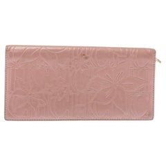 Carolina Herrera portefeuille continental en cuir embossé rose