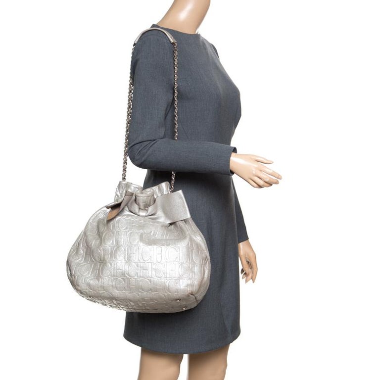 Carolina Herrera Silver Monogram Embossed Leather Bow Bucket Shoulder Bag For Sale at 1stDibs