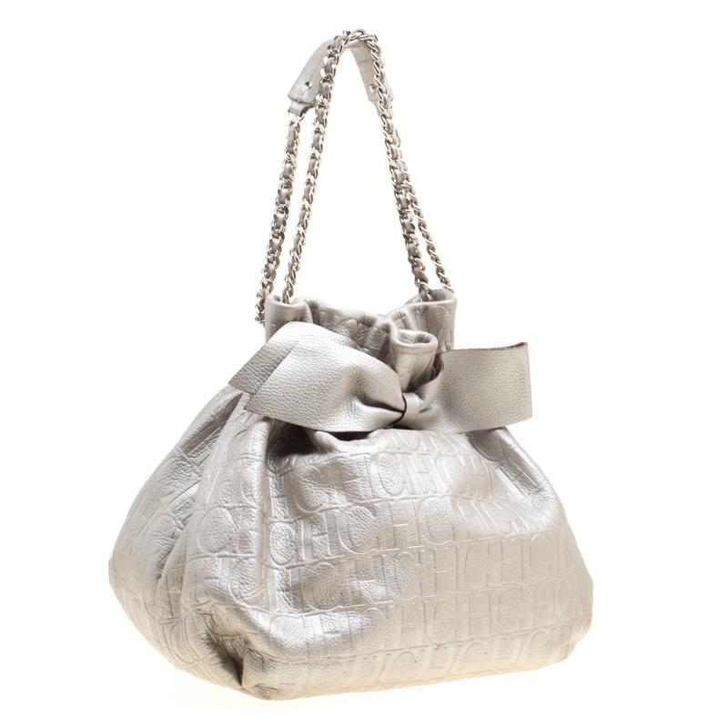 Carolina Herrera Silver Monogram Embossed Leather Bow Bucket Shoulder Bag In Good Condition In Dubai, Al Qouz 2