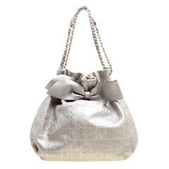 Carolina Herrera Silver Monogram Embossed Leather Bow Bucket Shoulder Bag