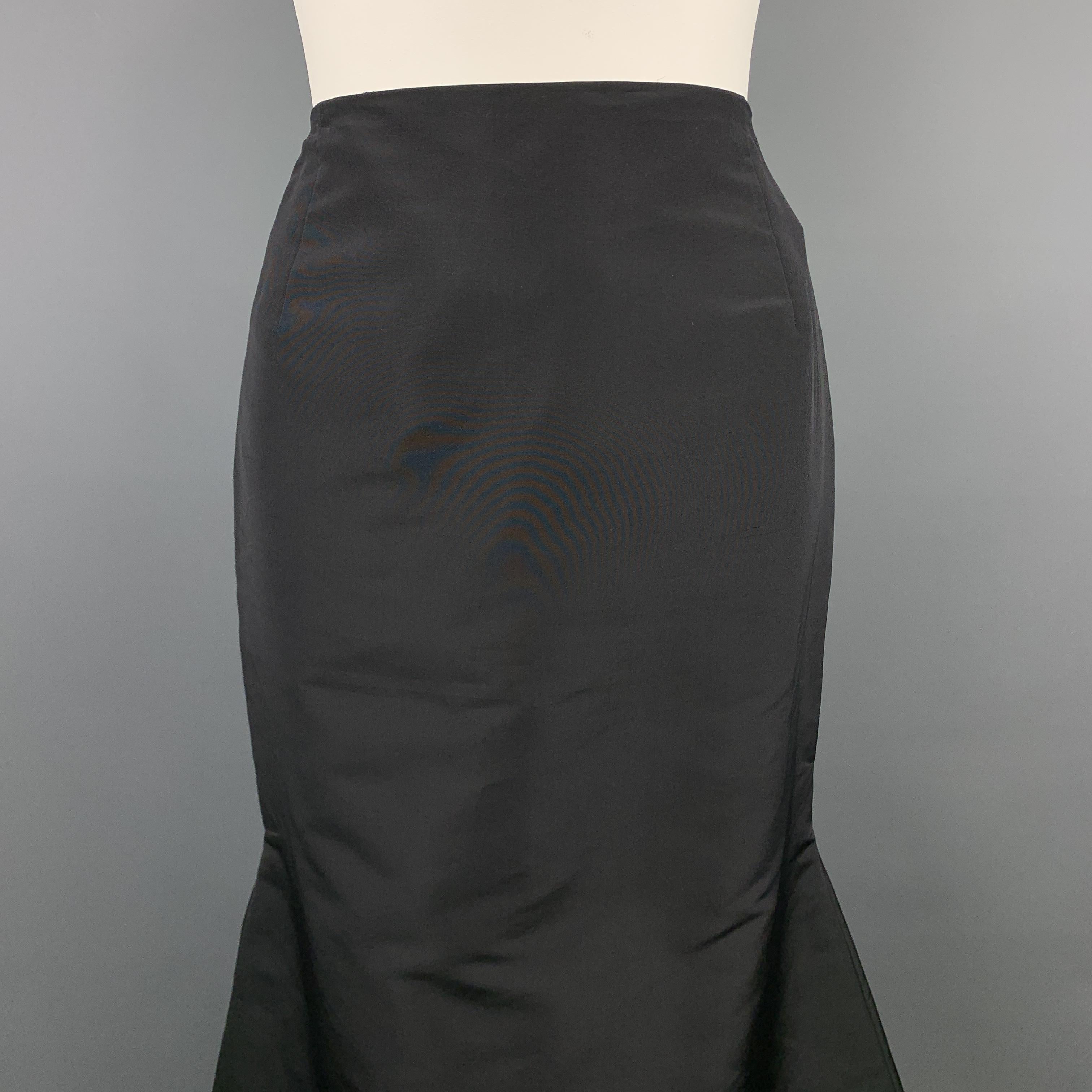 CAROLINA HERRERA evening skirt comes in black silk faille taffeta with a high rise pencil like silhouette that flares out at the hem into a train. Made in USA.

Excellent Pre-Owned Condition. Retails: $1,990.00.
Marked: 12

Measurements:

Waist: 32