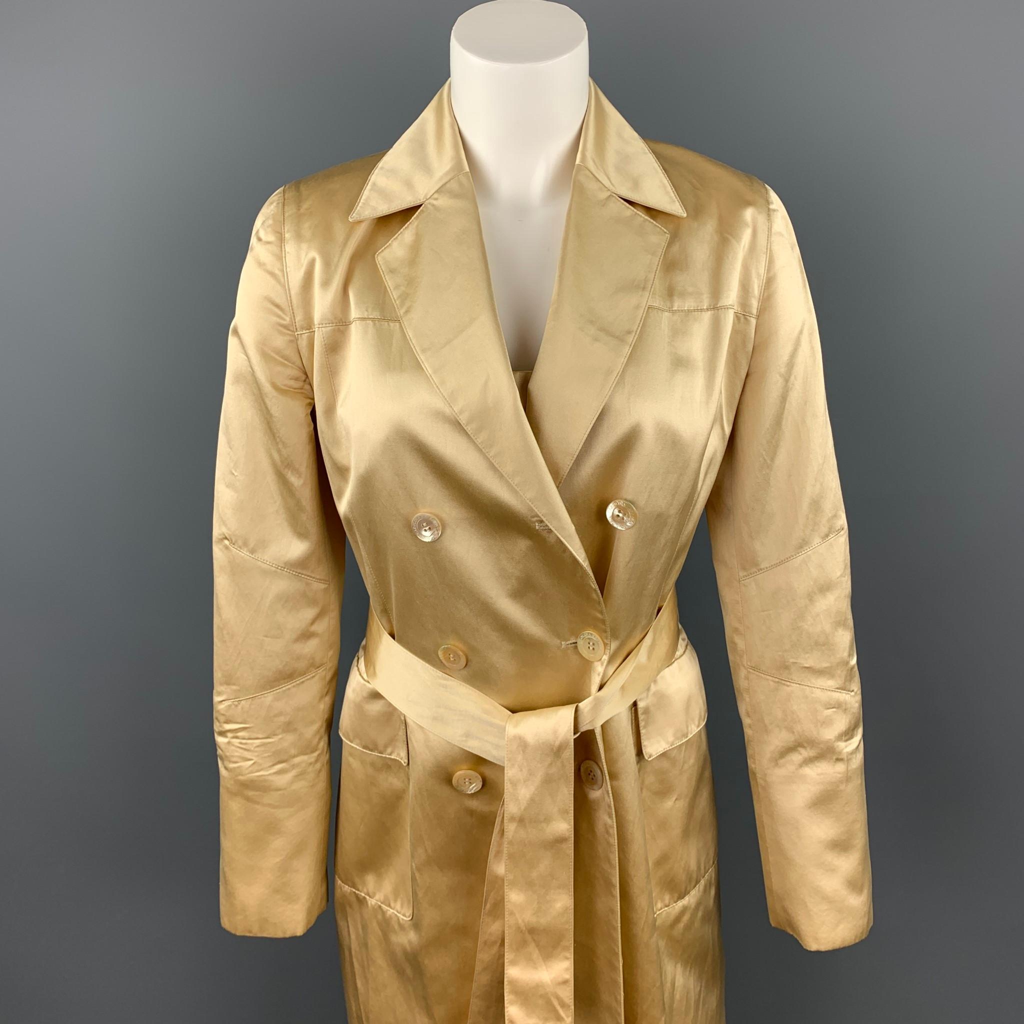 CAROLINA HERRERA 2 PC dress set comes in a gold satin silk featuring a sheath style, spaghetti straps, belted, and zip up closure. Also, includes a matching belted coat with a notch lapel style, flap pockets, and a double breasted closure. Minor