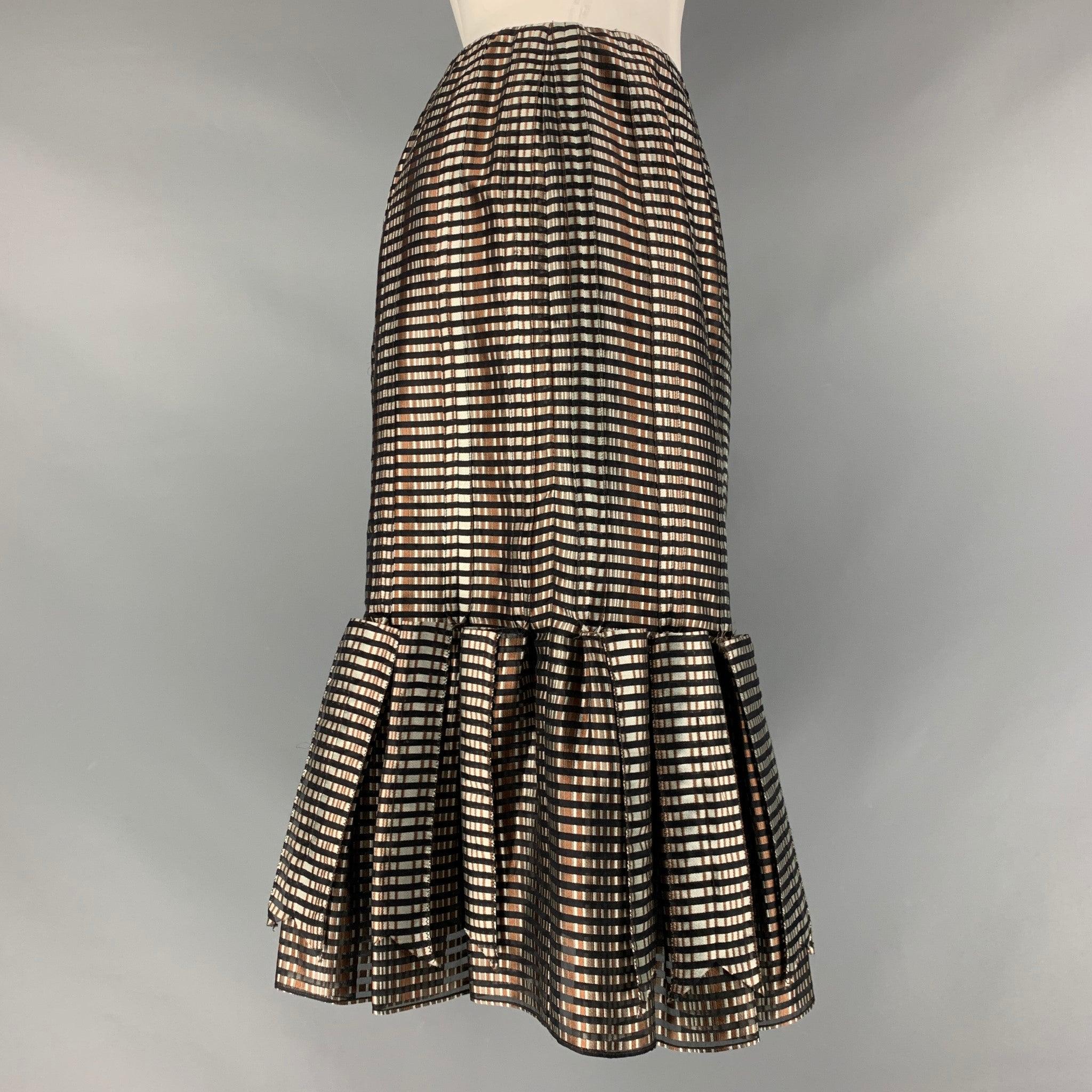 CAROLINA HERRERA skirt comes in a black, brown and grey checkered silk featuring a pleated style, and a center back invisible zip up closure. Made in USA.Very Good Pre-Owned Condition. Fabric tags removed. 

Marked:   4 

Measurements: 
  Waist: 29