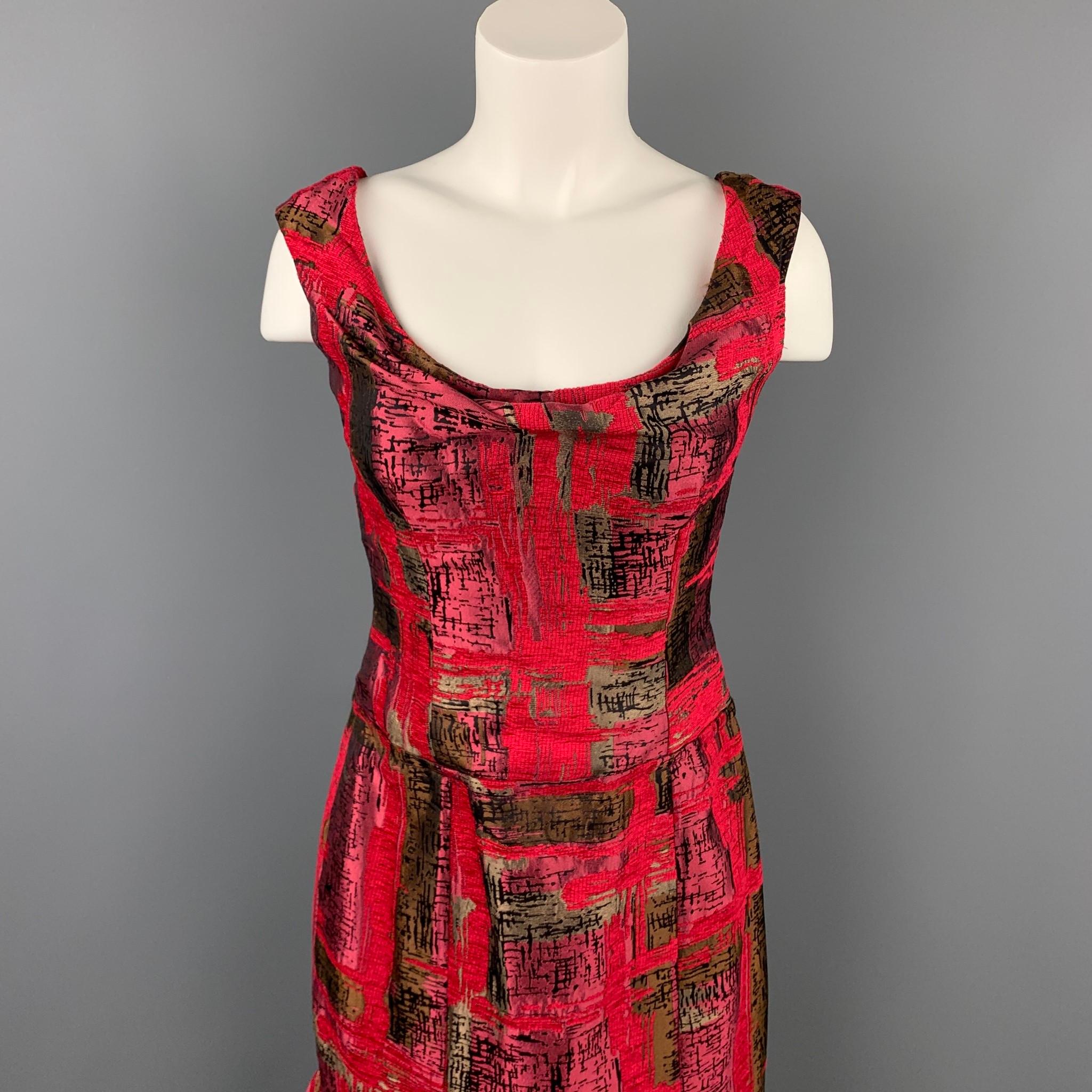 CAROLINA HERRERA cocktail dress comes in a red jacquard silk featuring a tulip style, ruffled skirt, and a back zip up closure. Made in USA.

Very Good Pre-Owned Condition.
Marked: 8

Measurements:

Bust: 30 in.
Waist: 30 in.
Hip: 38 in.
Length: 31