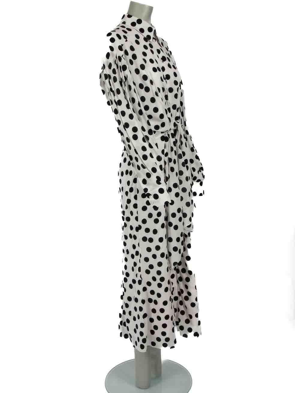 CONDITION is Very good. Hardly any visible wear to dress is evident on this used Carolina Herrera designer resale item.
 
Details
White
Viscose
Shirt dress
Polkadot pattern
Midi
Long sleeves
Button up fastening
Round neck
Waist tie belt
  
Made in