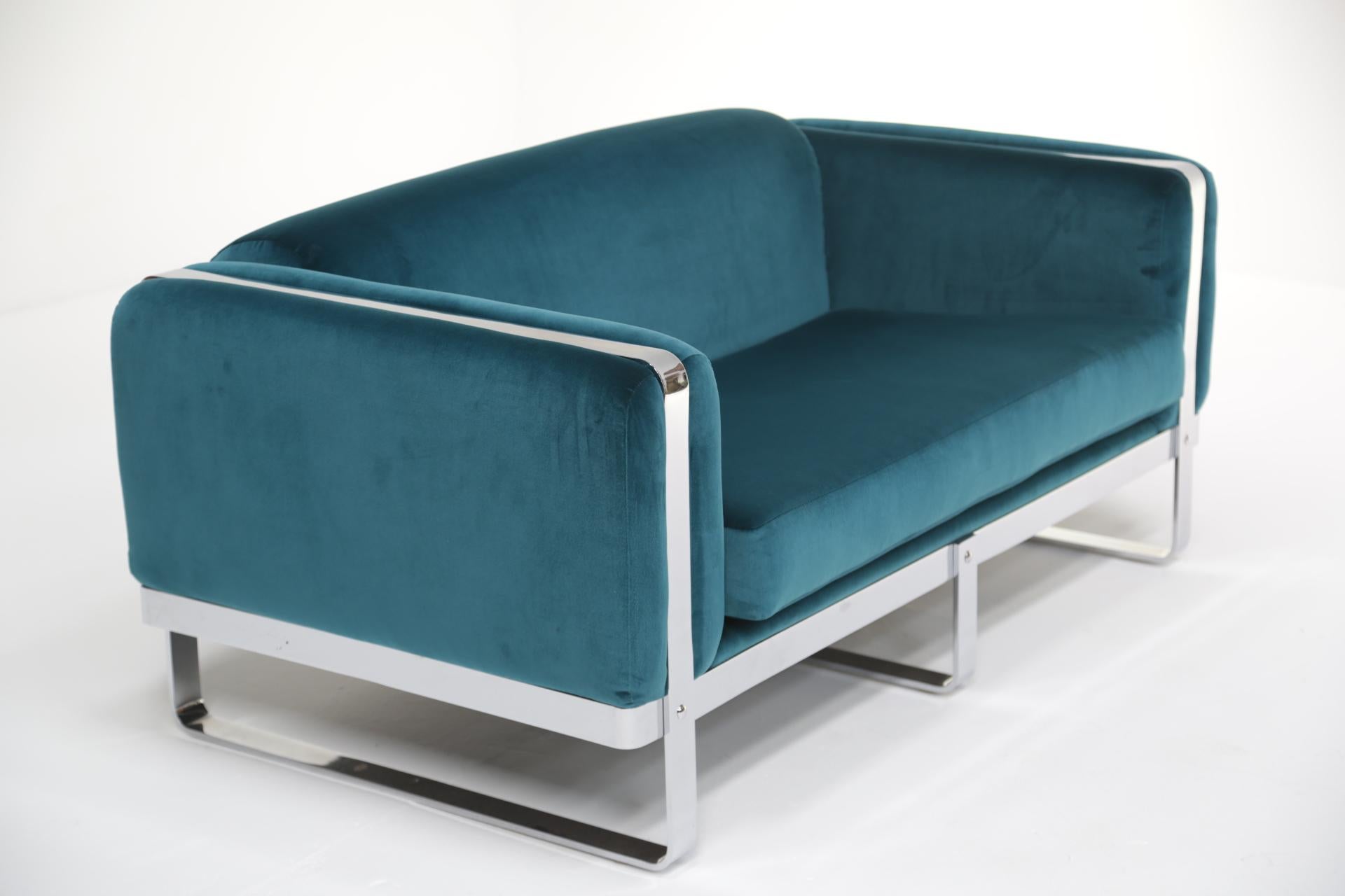 teal sofa and loveseat
