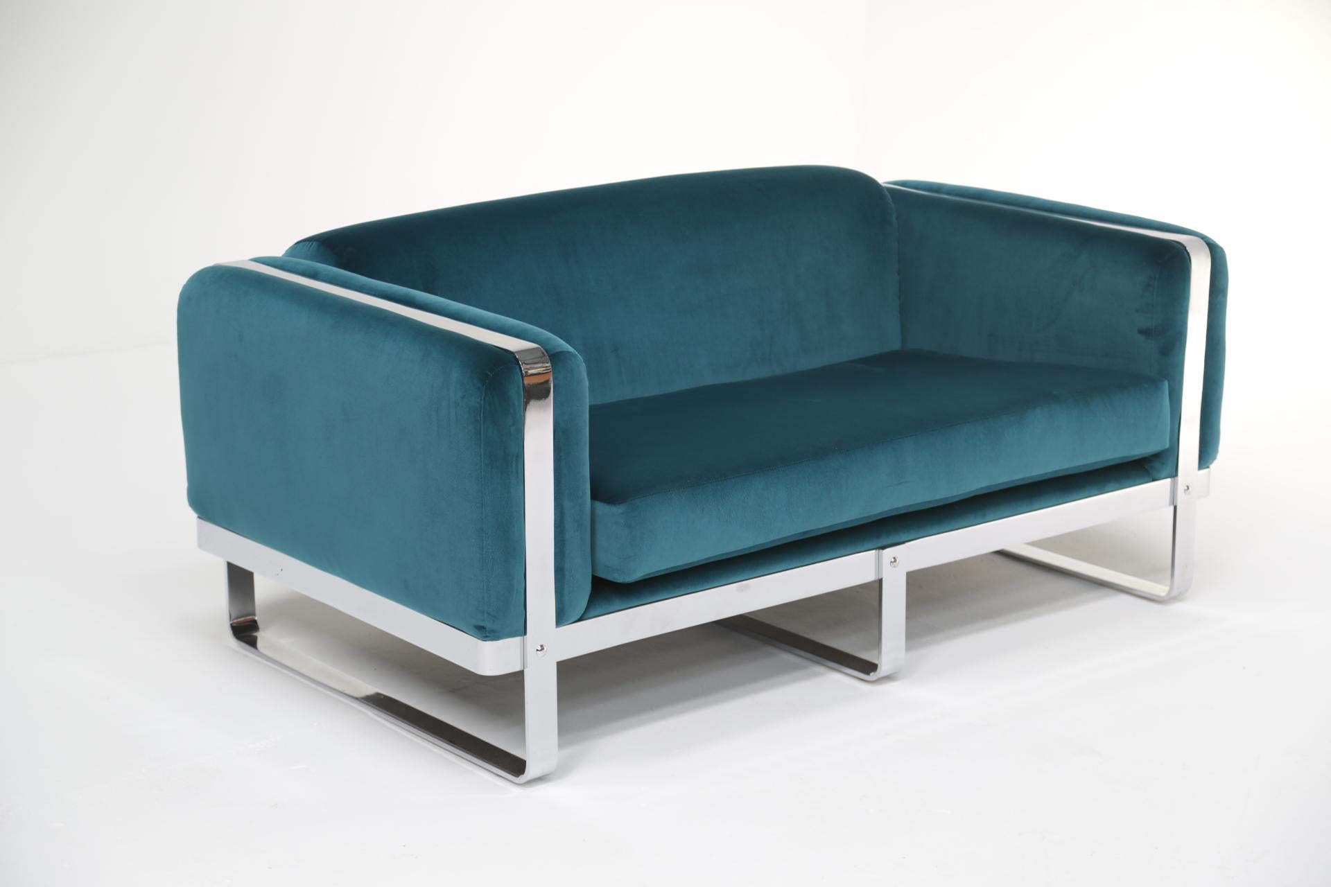 American Carolina Seating Company mid-century chrome loveseat sofa in teal velvet. For Sale