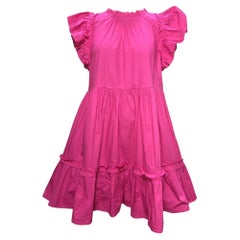 Vestido mini con volantes y capas de Caroline Constas, de algodón rosa