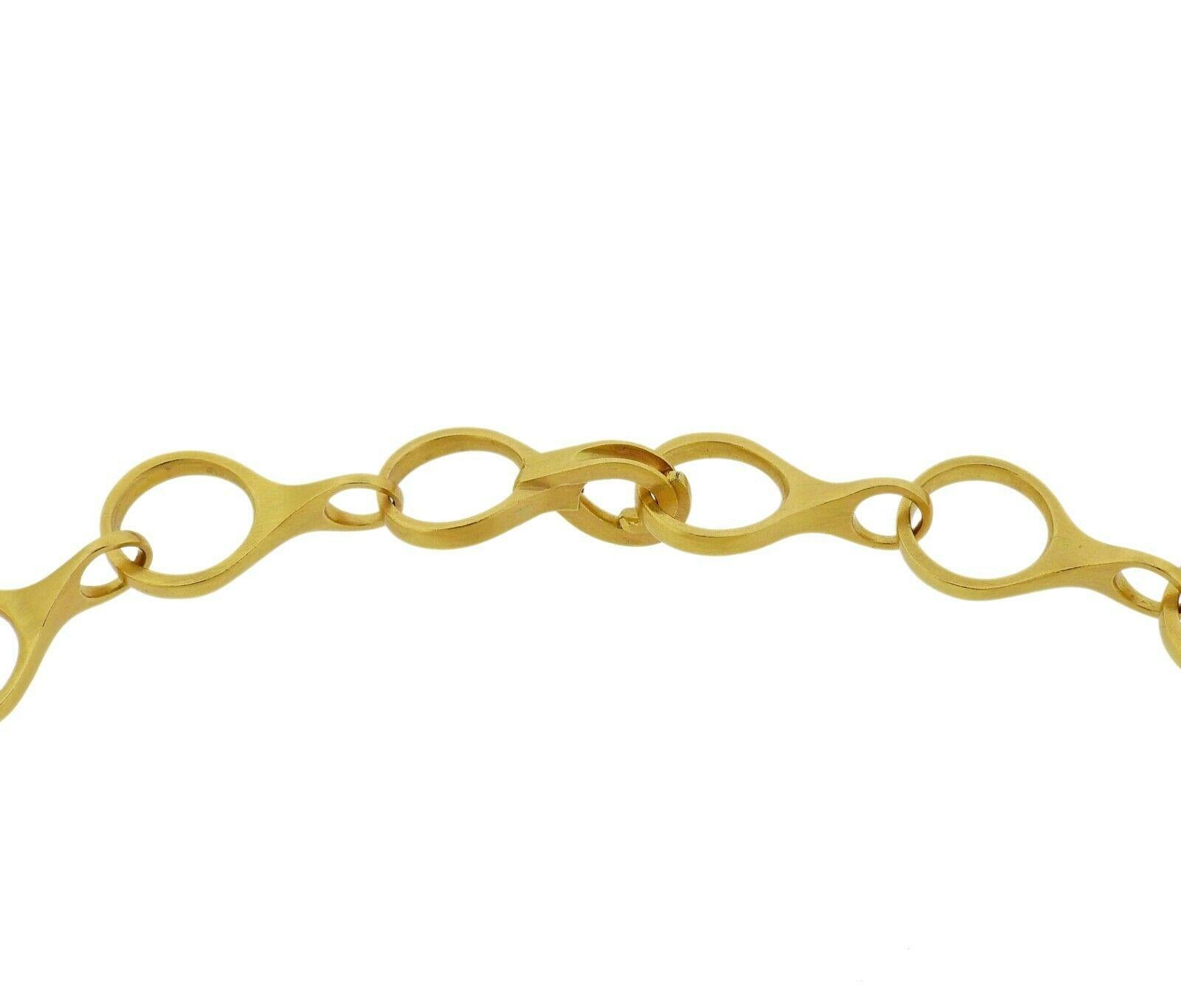 Delicate 20k gold link necklace by Caroline Ellen.   Necklace is 17