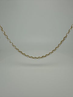 Bracciale tennis con diamanti Caroline Marquise incastonati a est-ovest in oro giallo 14K